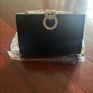 Elegant Black Clutch with Silver Accent